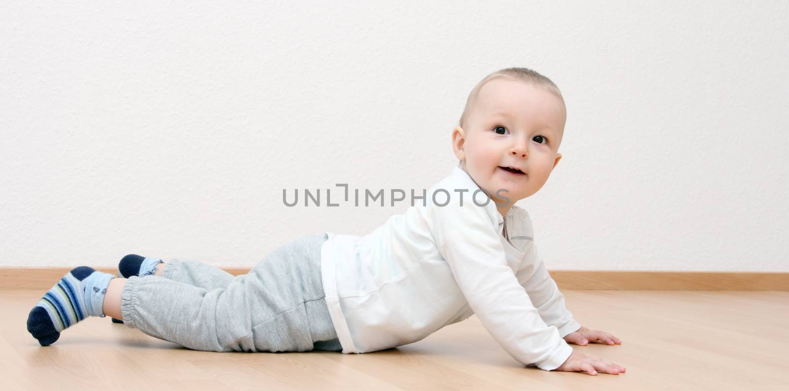 happy baby boy crawling