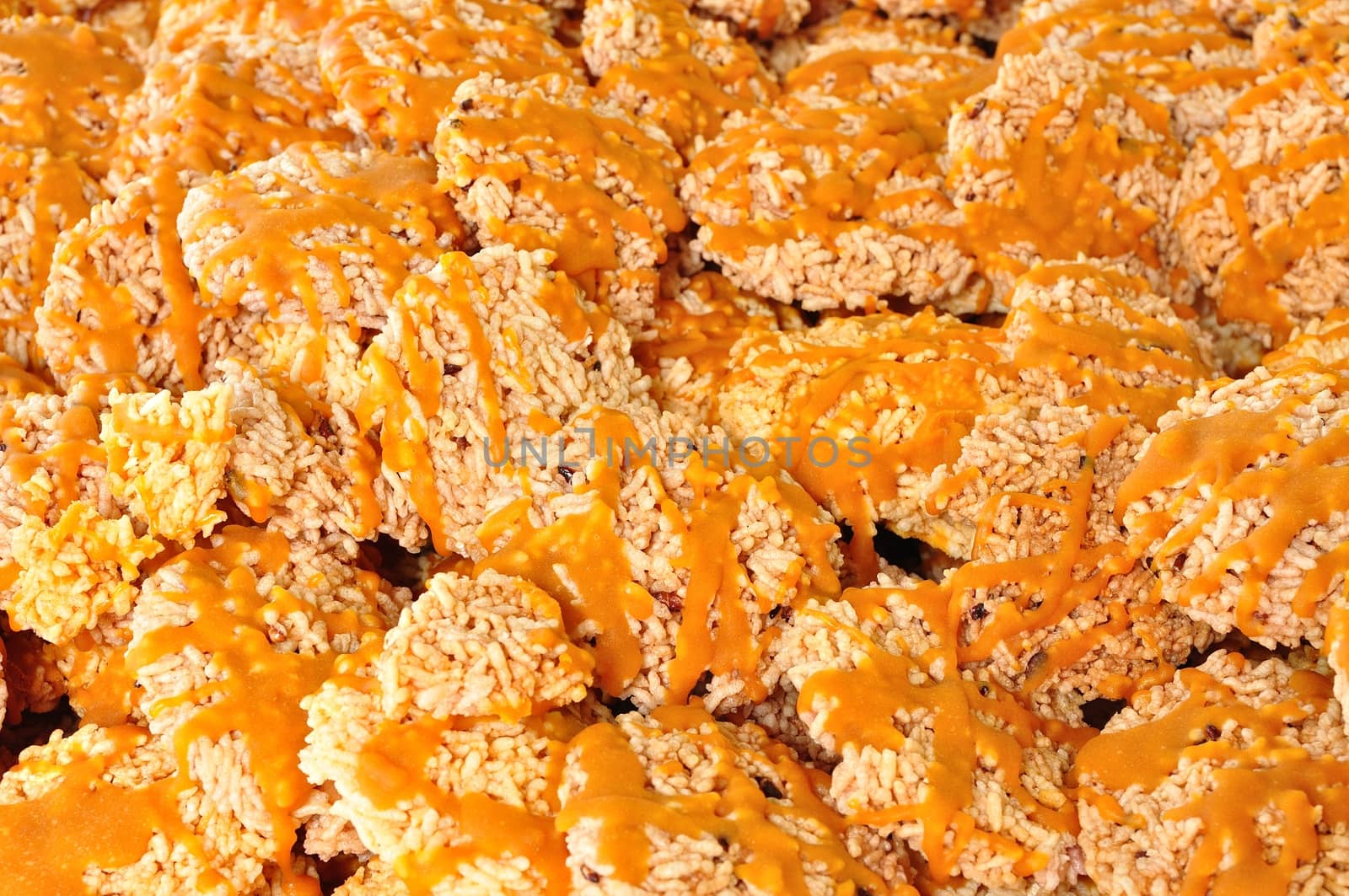 Khao Tan (Rice Cracker). Its crispiness of sticky rice and sweetness from brown sugar give naturally delicious flavors.