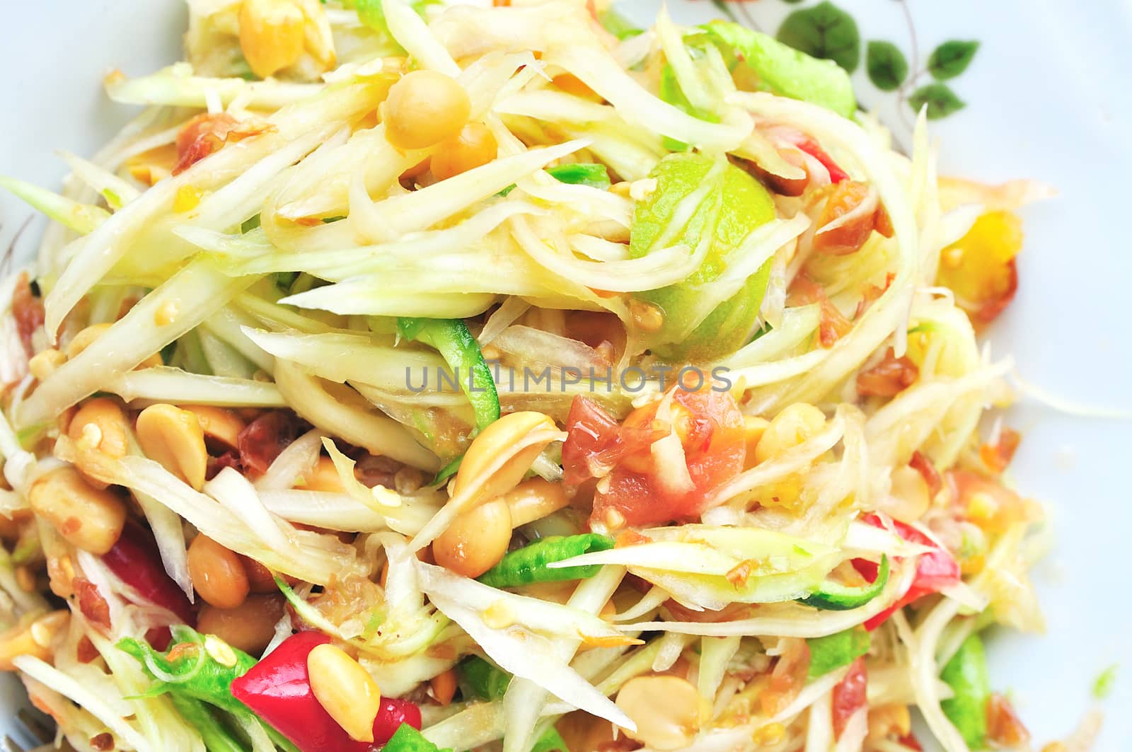 Green papaya salad Thai cuisine spicy delicious : " SOM TAM " Thai speak