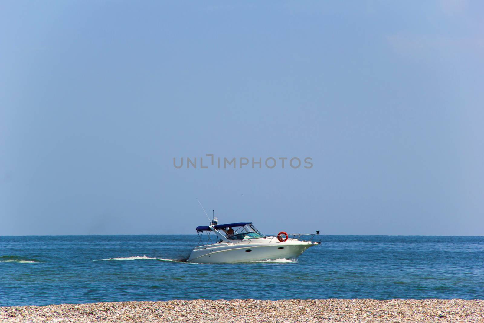 small small white boat in the sea