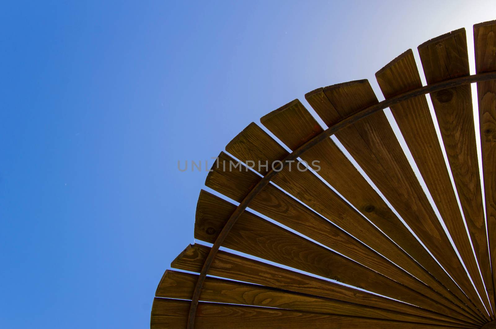 wood canopy on the  sky background protection from the sun