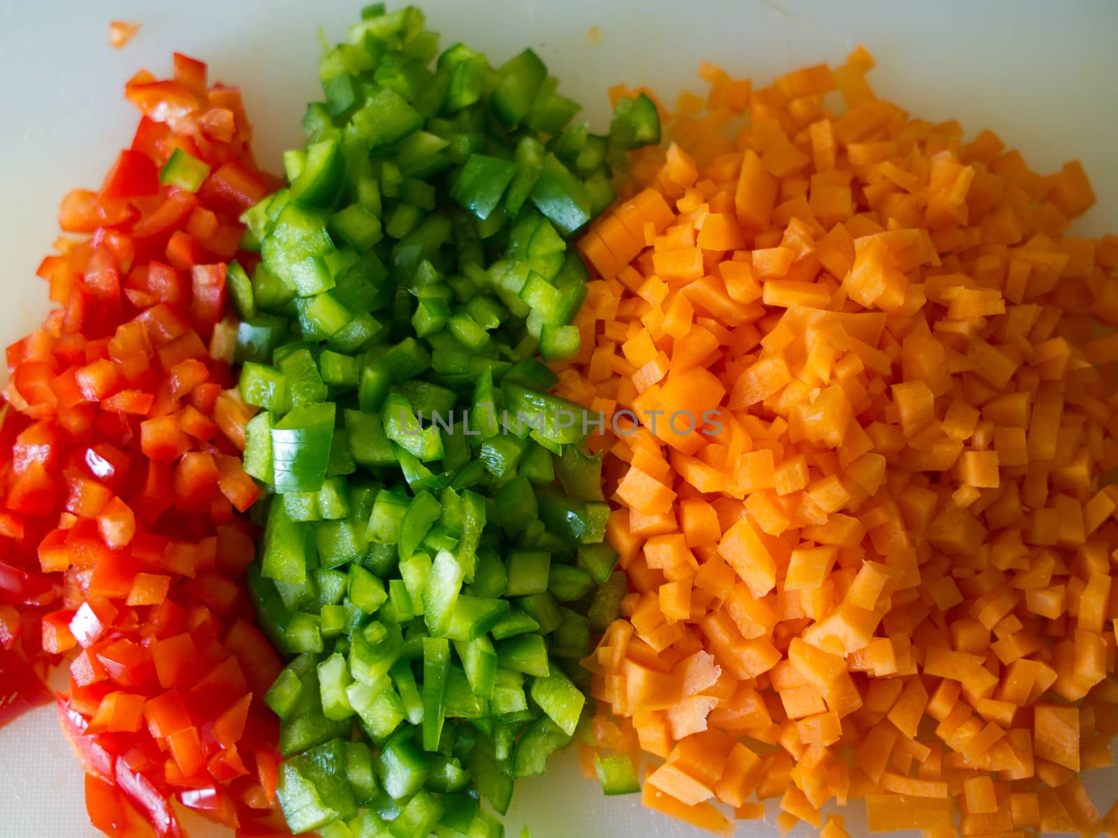 Close up of freshly cut raw vegetables ingredients for a salad