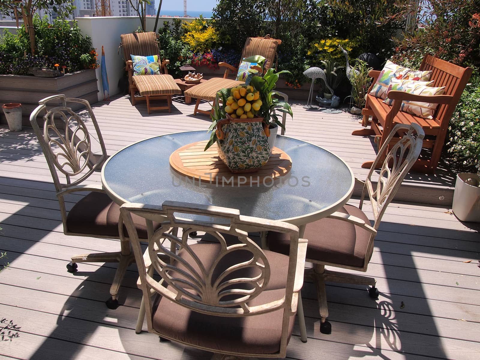 Beautiful classical design blooming rooftop garden in city urban setting