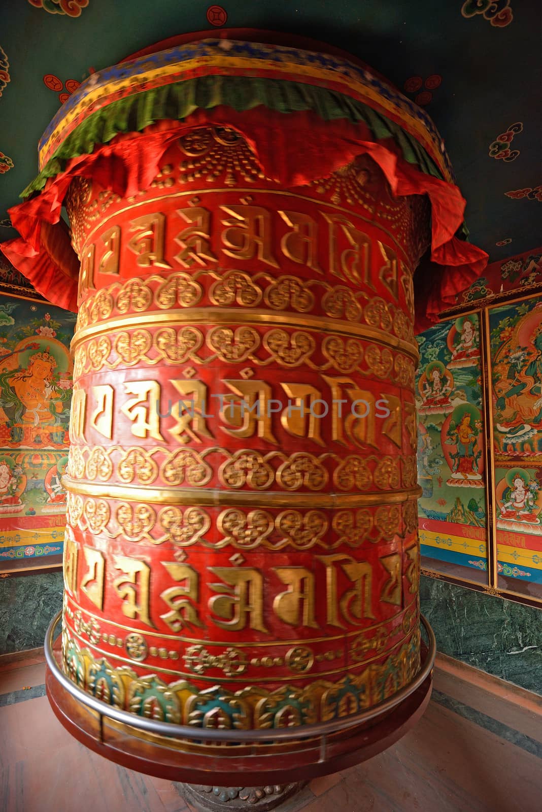 Huge rotating praying drum in Boudhanath stupa, Kathmandu, nepal