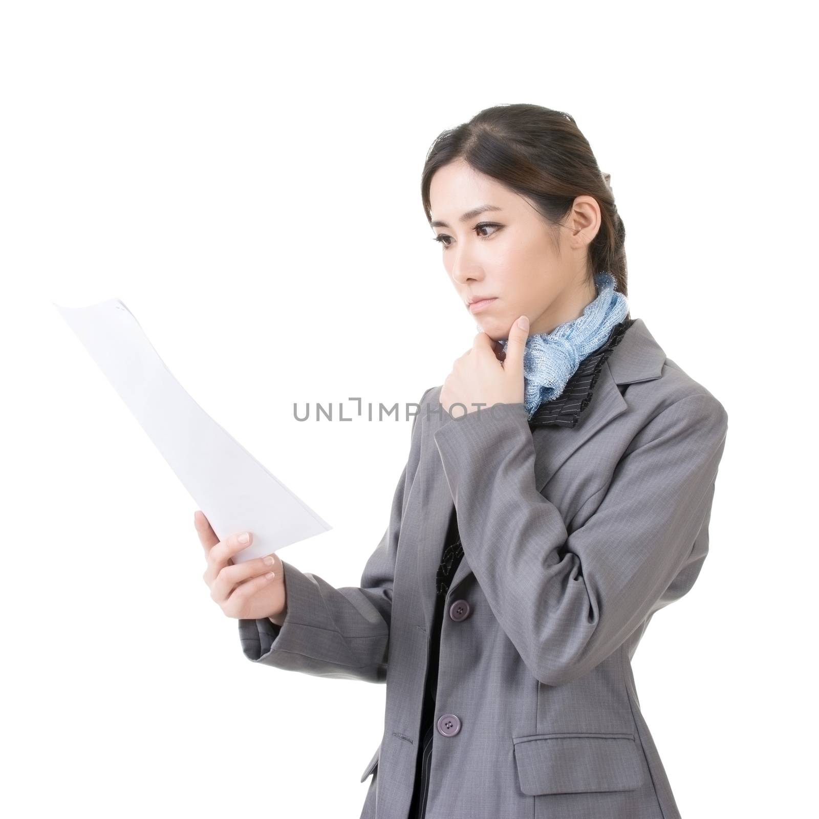 Pensive asian business woman holding file document paper. Isolated on the white background.