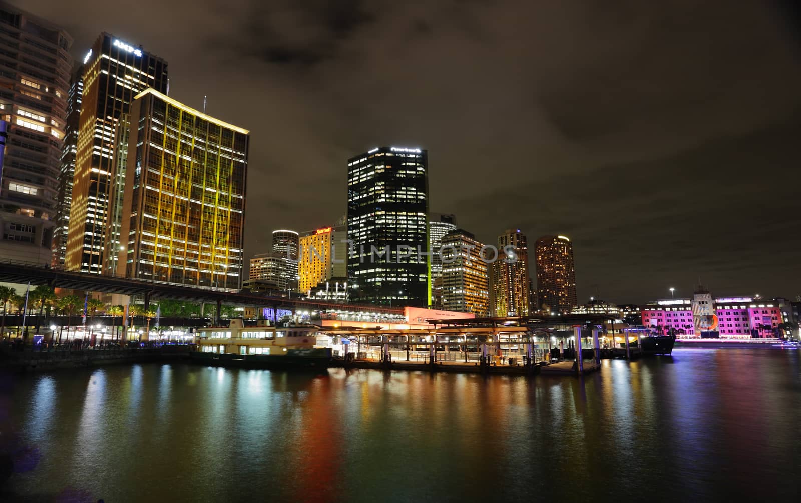 SYDNEY NSW, AUSTRALIA - JUNE 3  2014; Sydney City and Circular Quay lit up in vibrant colour during annual Vivid Festival