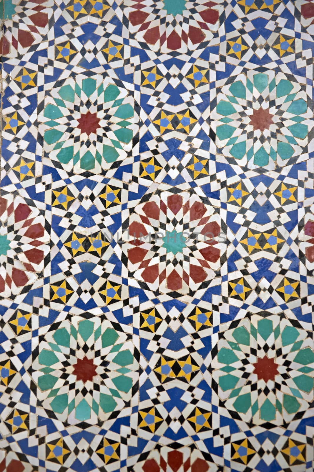 Detail of ornate mosaic on the entrance gates to the Royal Palace in Fes, Morocco