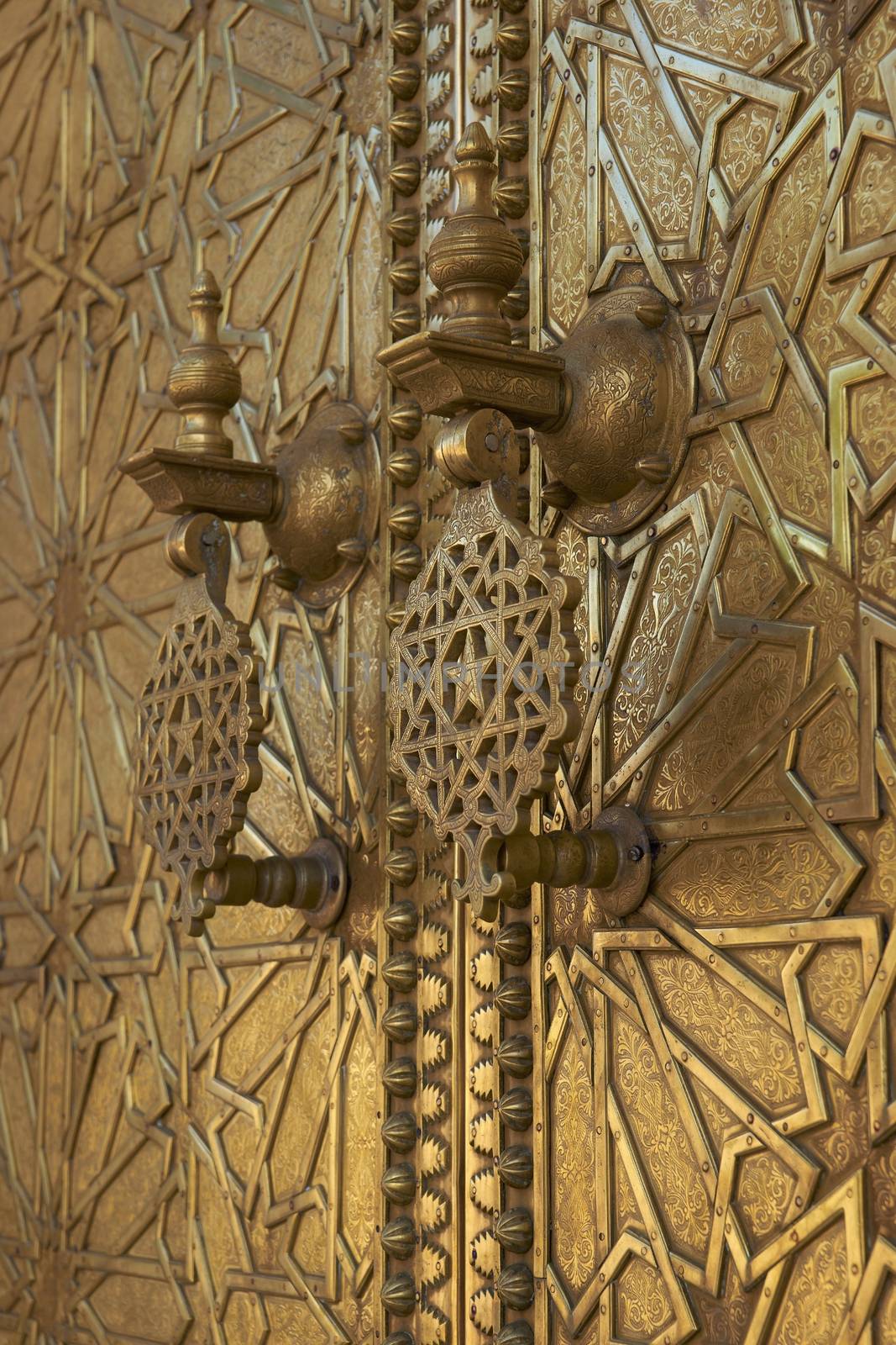 Detail of the ornate door knockers at the Royal Palace in Fes, Morocco