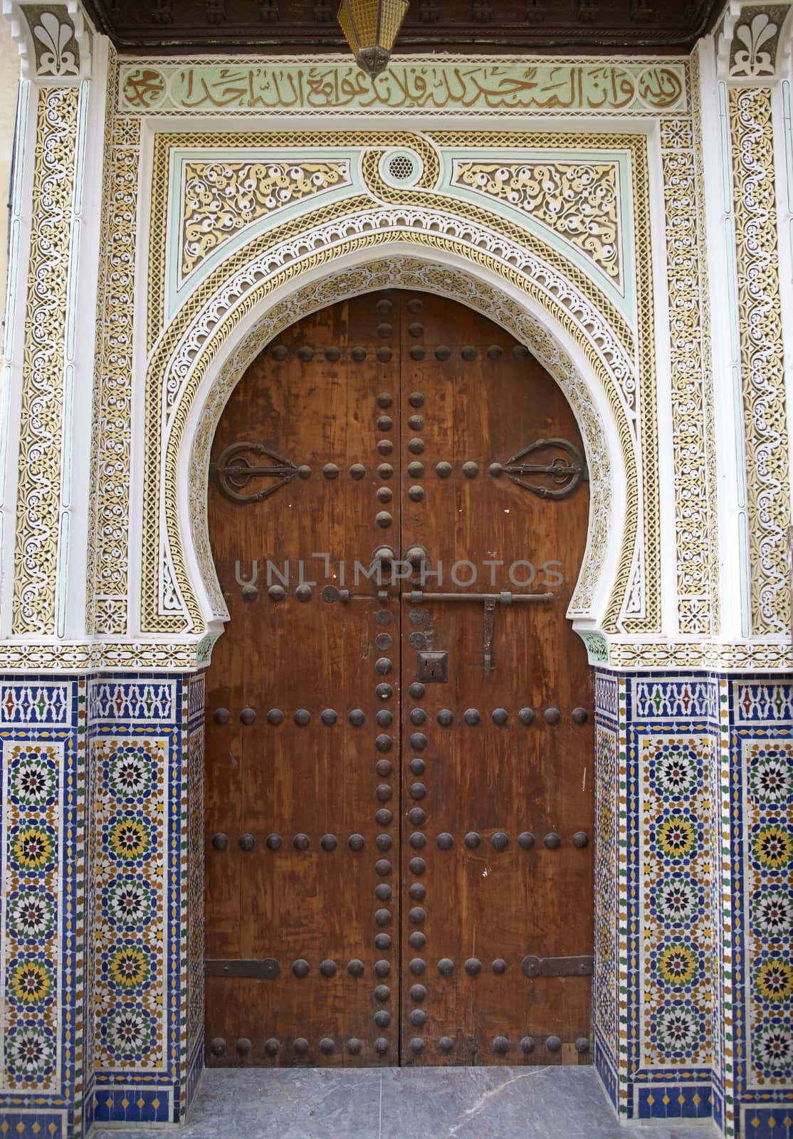 Old door in the historic medina in the ancient city of Fes in Morocco