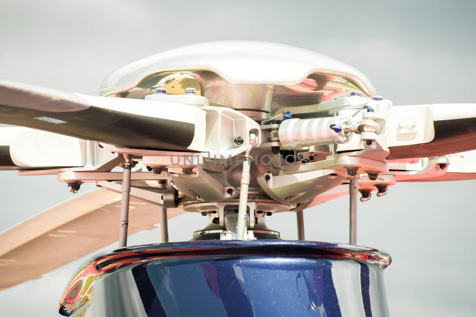 closeup of a complex helicopter rotor blade assembly