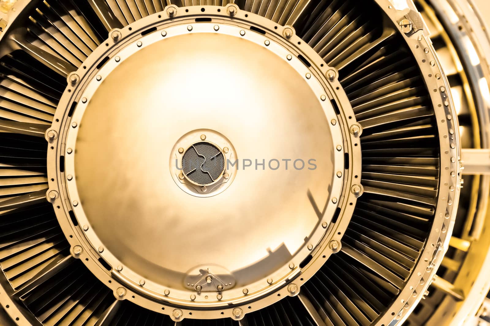 aircraft jet engine abstract with a golden tint
