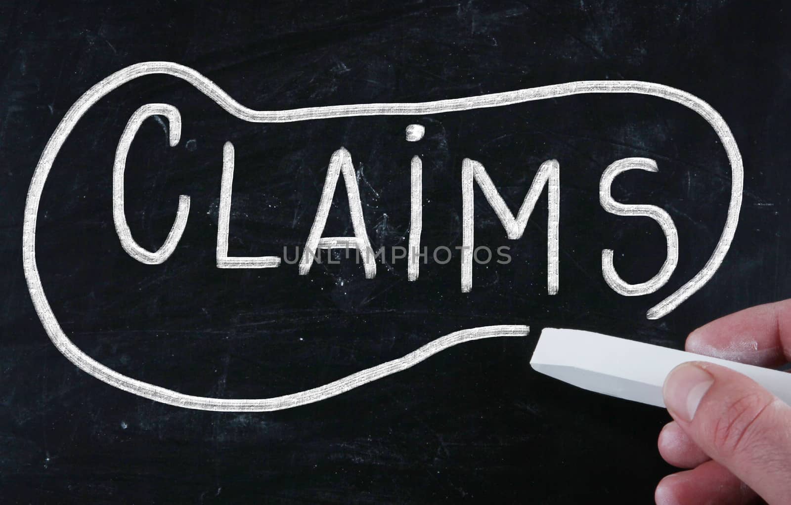 claims handwritten with chalk on a blackboard