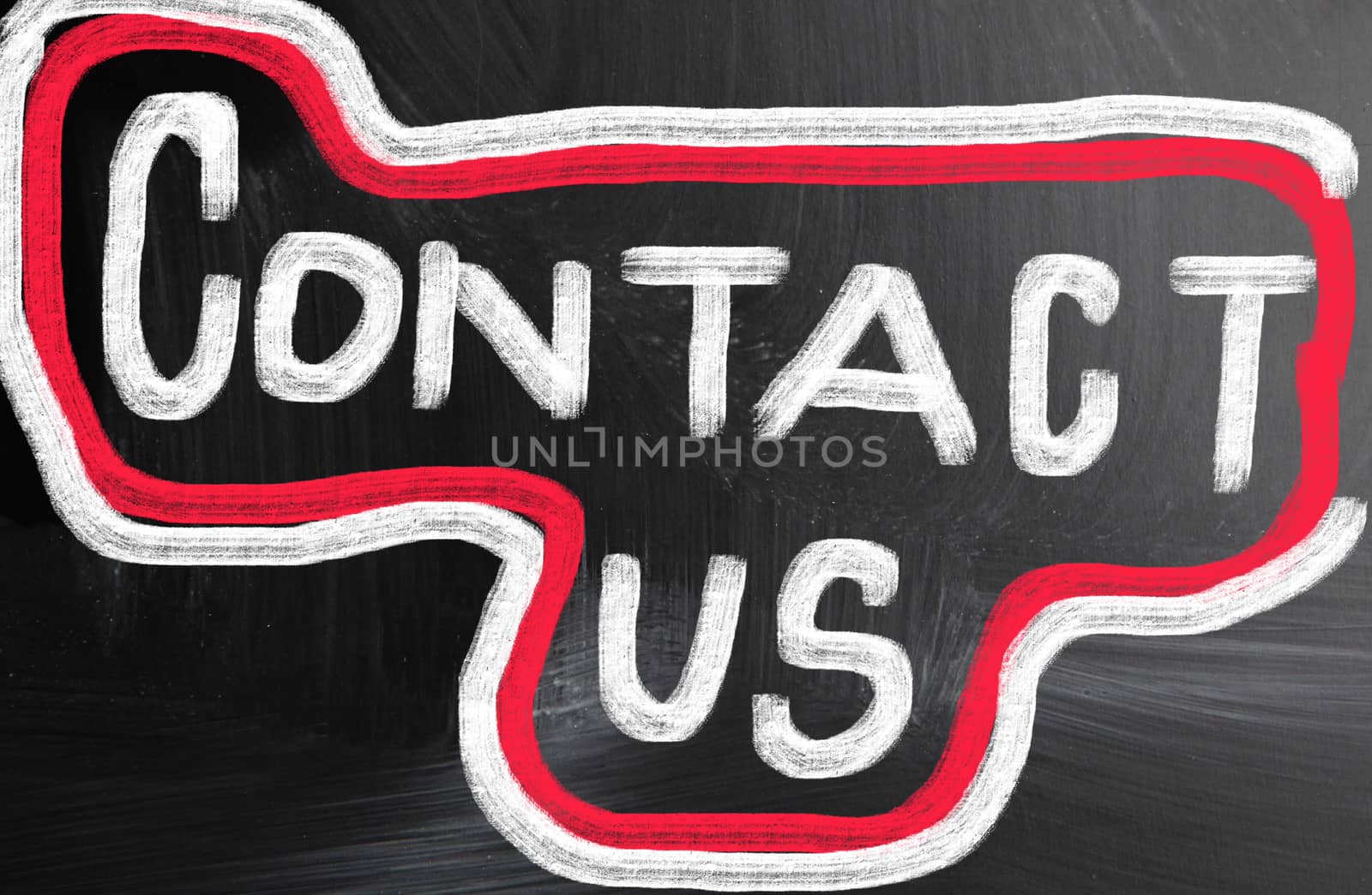 contact us handwritten with chalk on a blackboard