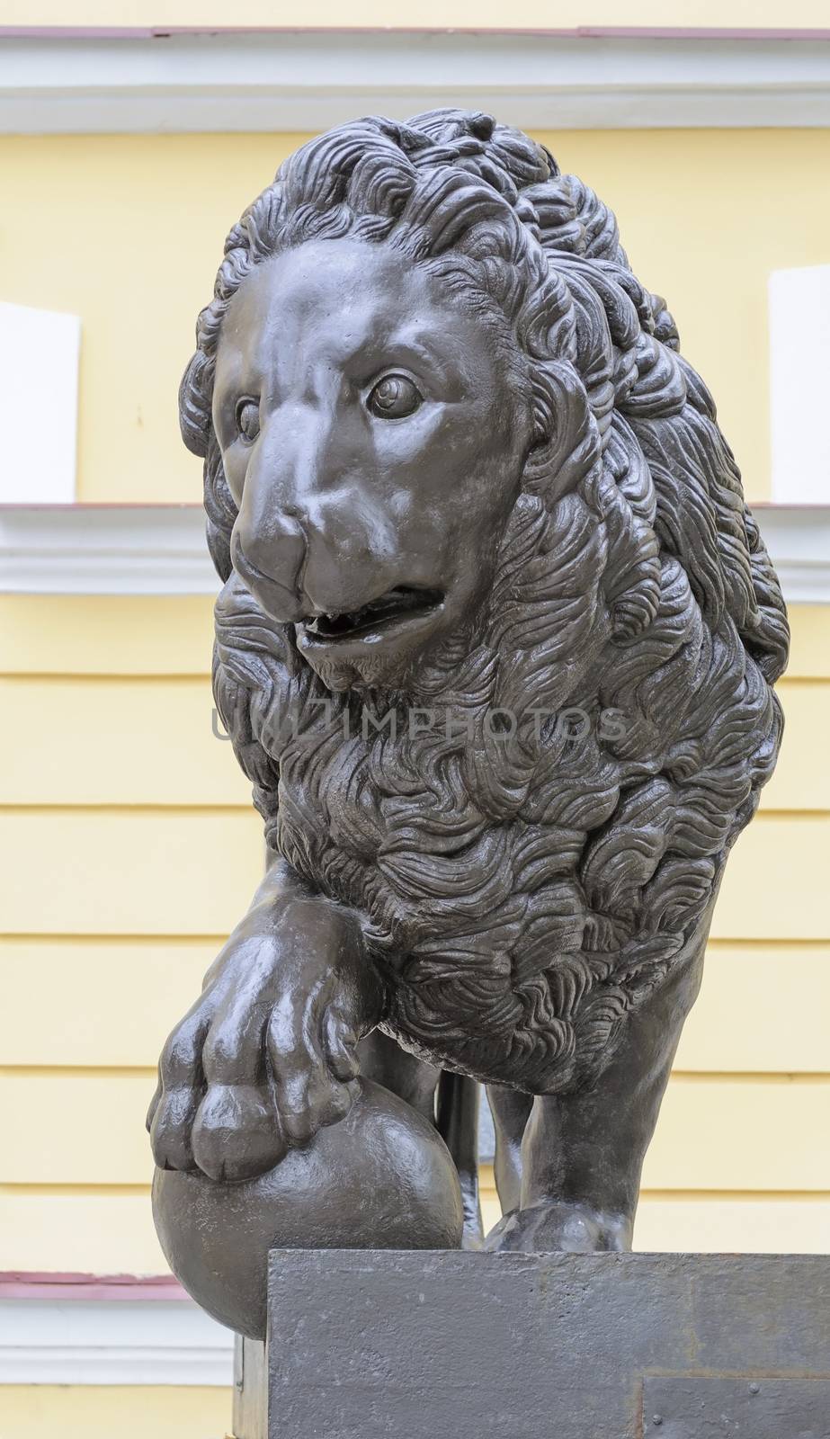 Bronze sculpture of lion with ball near the Novgorod State Museum, Russia