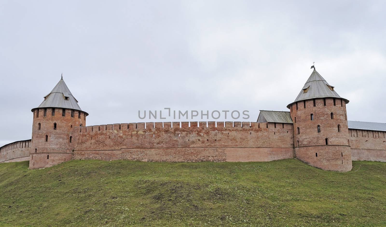 Fortification wall with two towers in Veliky Novgorod (Detinets), Russia