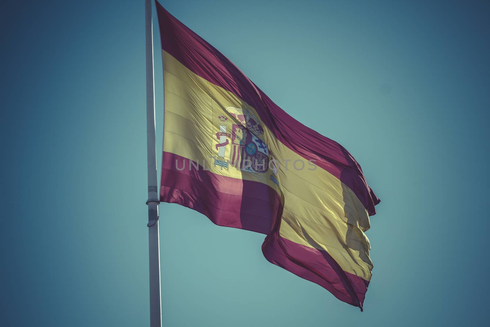 Spanish national flag. Plaza de Colon in Madrid, Spain. by FernandoCortes