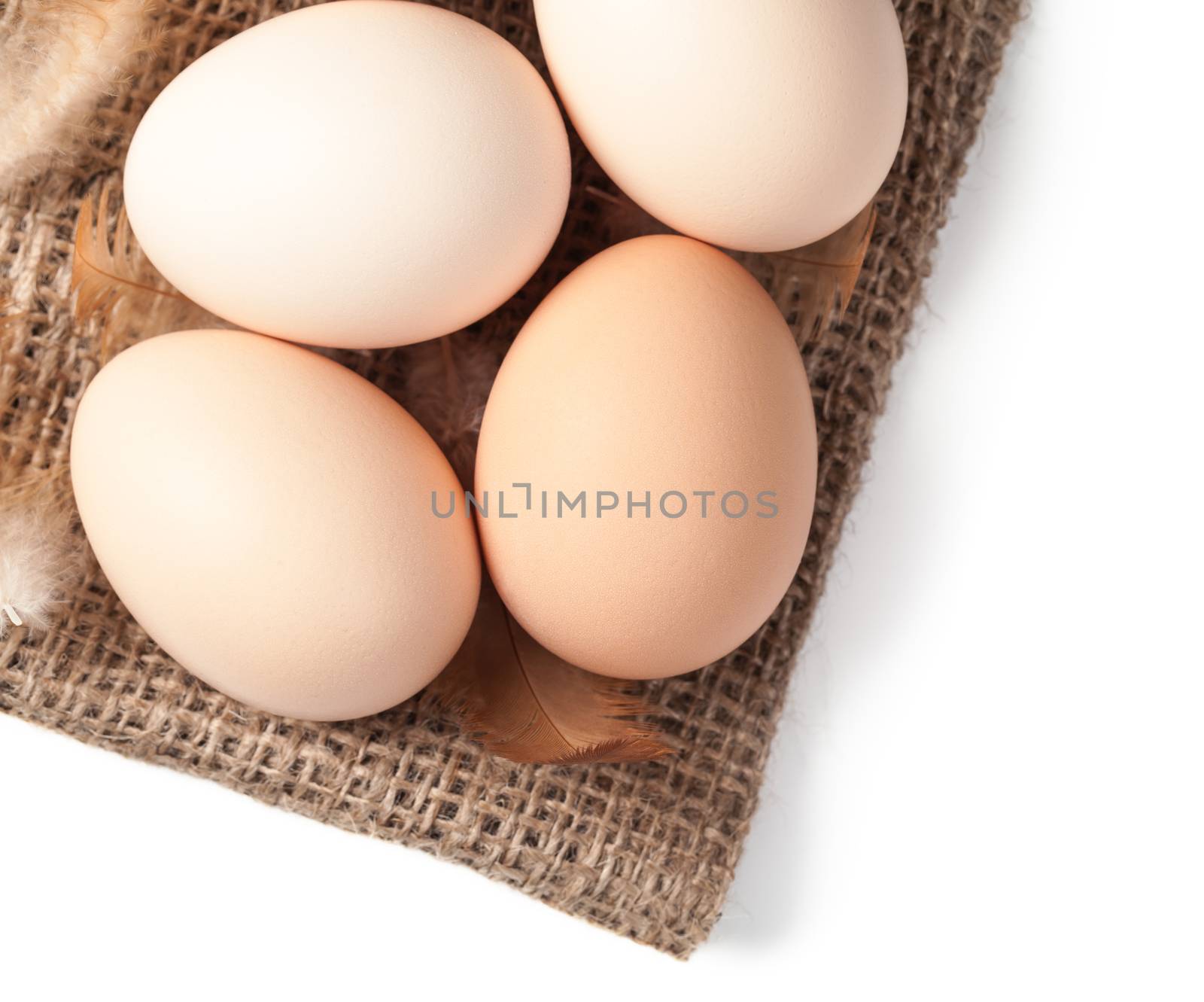 Fresh eggs on linen canvas. Top view