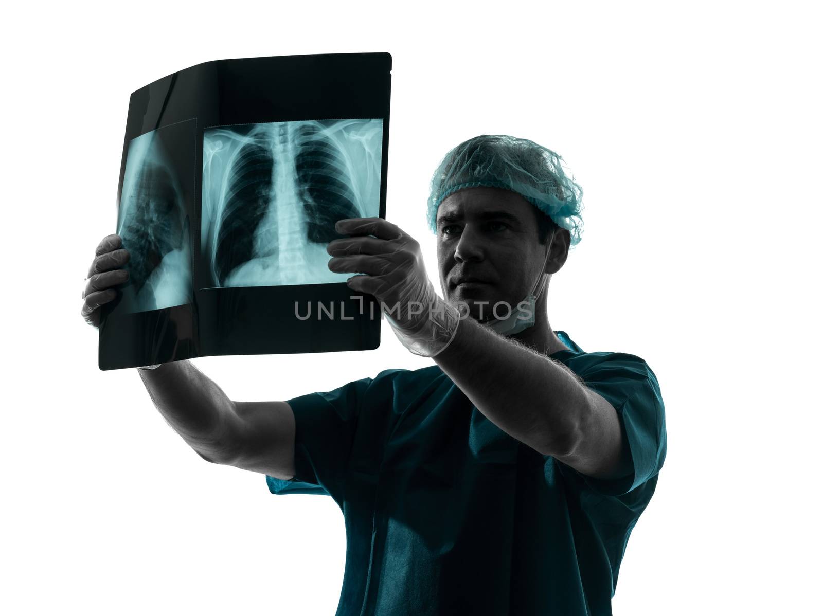 one caucasian man doctor surgeon radiologist medical examining lung torso x-ray image silhouette isolated on white background