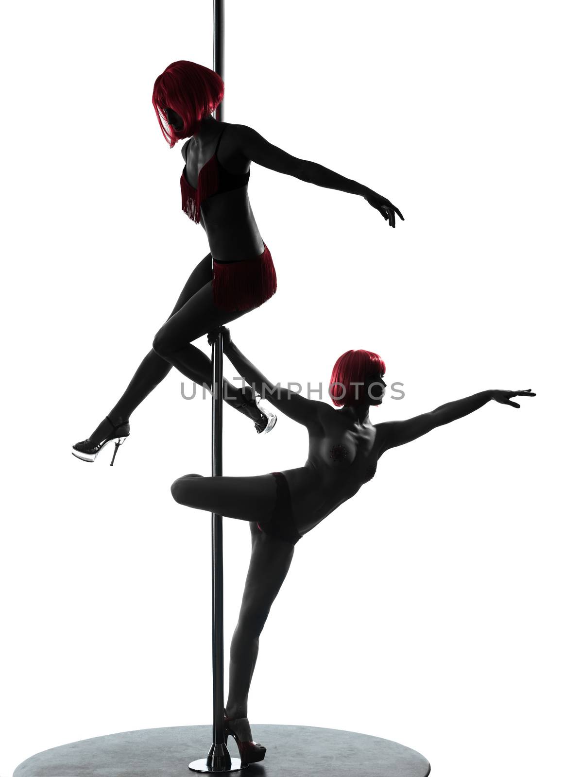 two women pole dancer silhouette by PIXSTILL