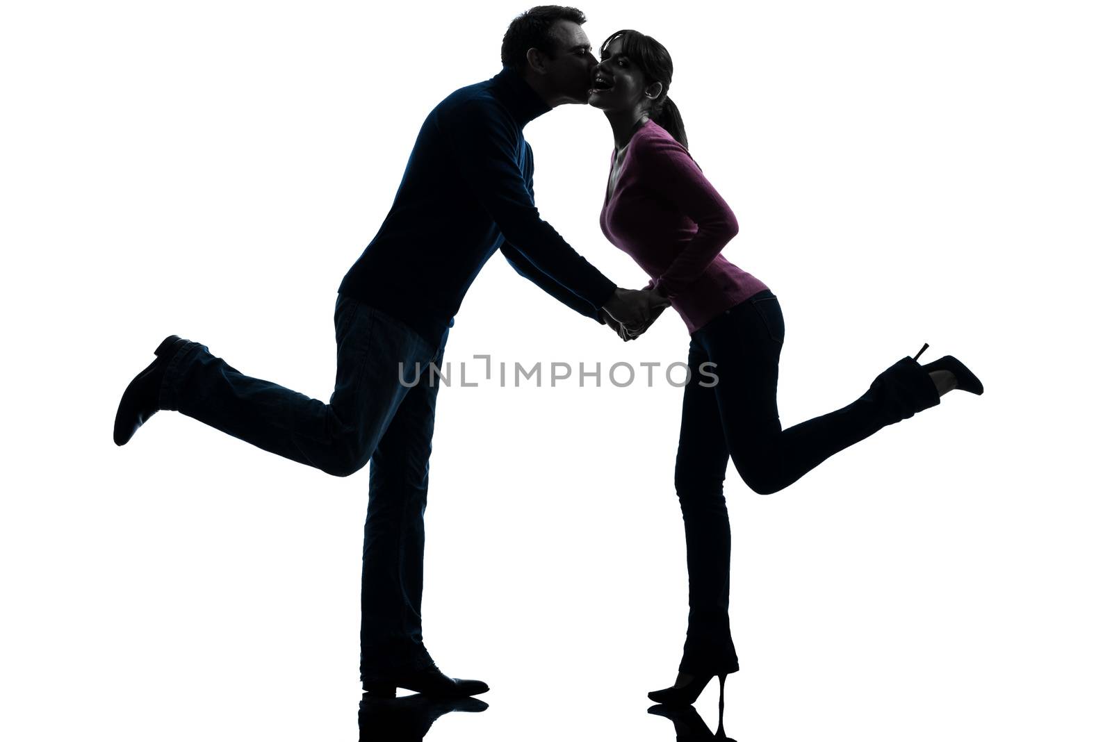 couple woman man lovers kissing   silhouette by PIXSTILL