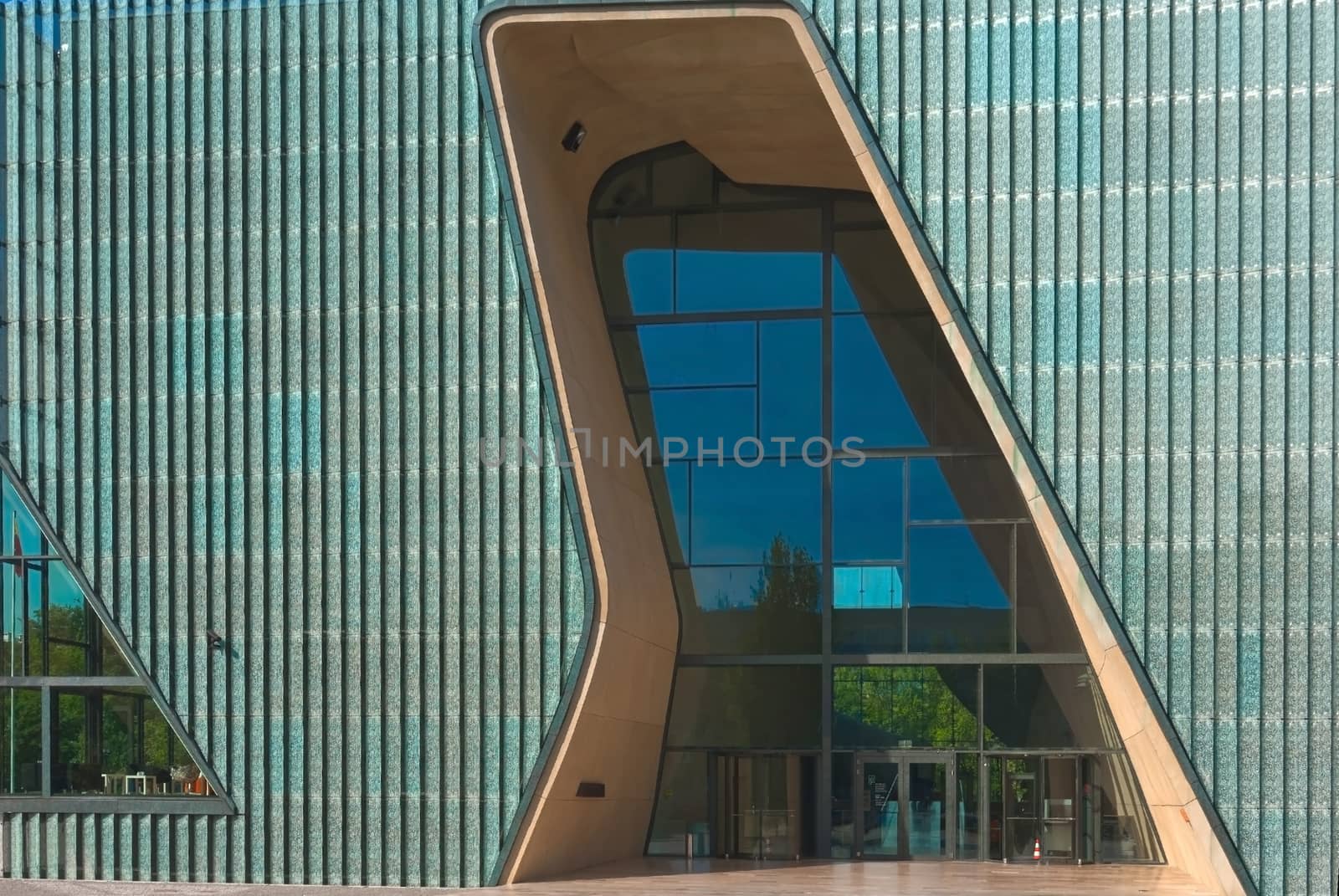 Main entrance and a façade of the new building of the Museum of the History of Polish Jews, Warsaw, Poland. The Museum is located  in Warsaw’s borough of Muranow, in the heart of the old Jewish quarter which became a part of the Warsaw Ghetto in 1940.