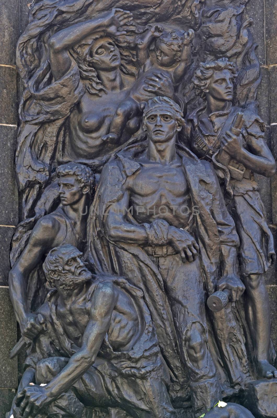 Front of the Nathan Rappaport's Warsaw Ghetto Monument, constructed in 1948 in commemoration of the Warsaw Ghetto Uprising in 1943. The bronze relief depicts the heroism of the Jewish resistance fighters.