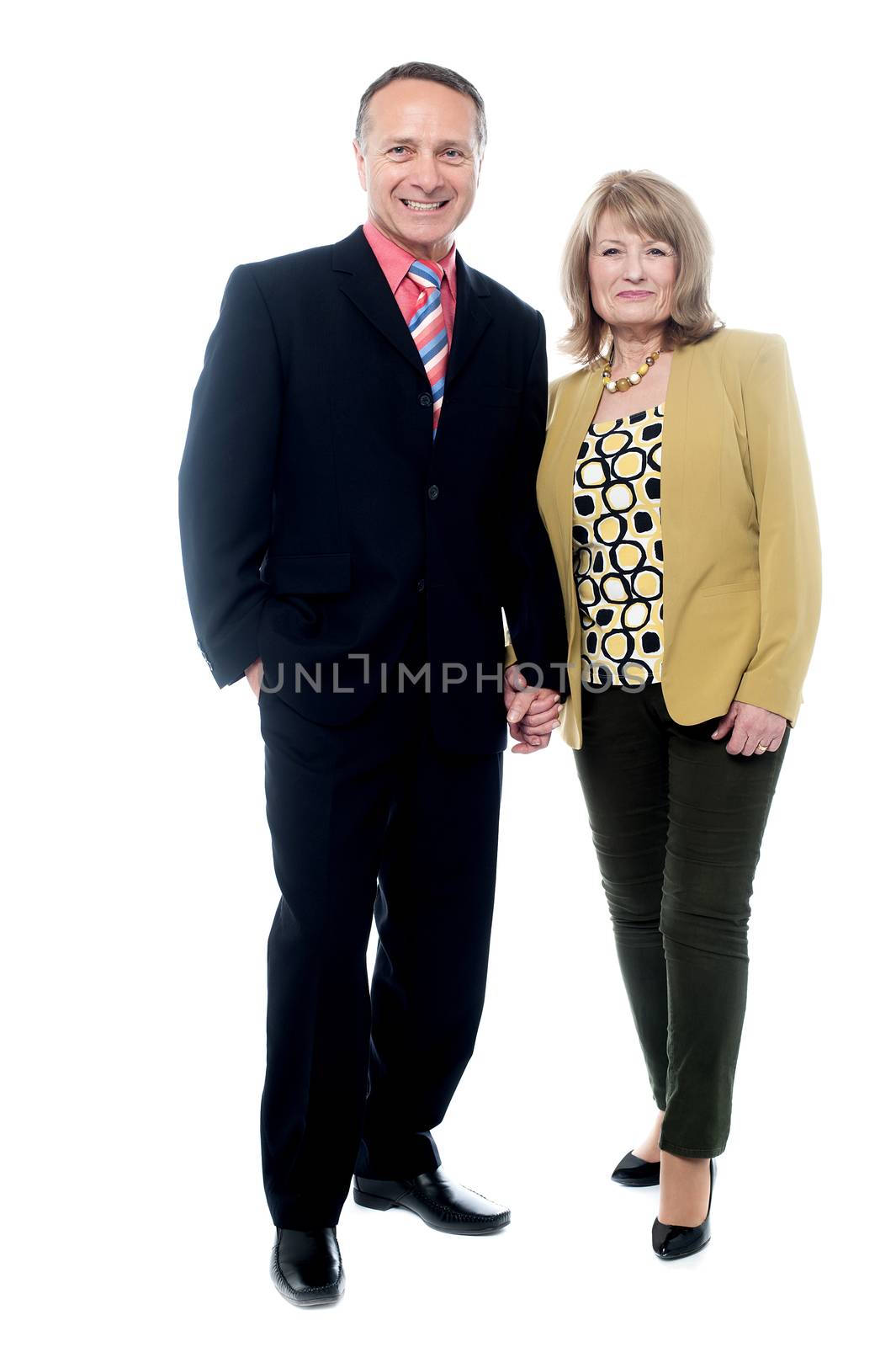 Senior couple posing together by stockyimages