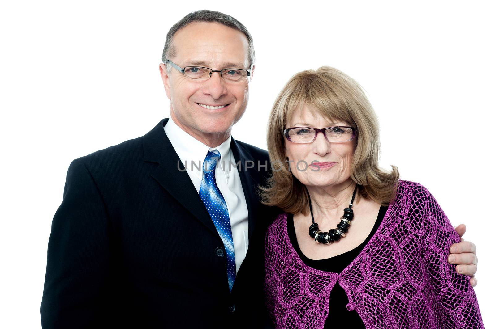 Happy senior couple posing to the camera