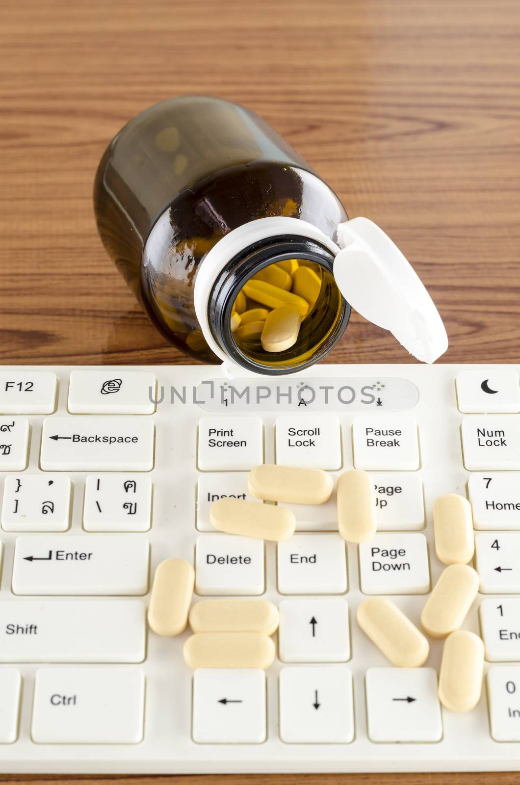 pills on keyboard computer by ammza12