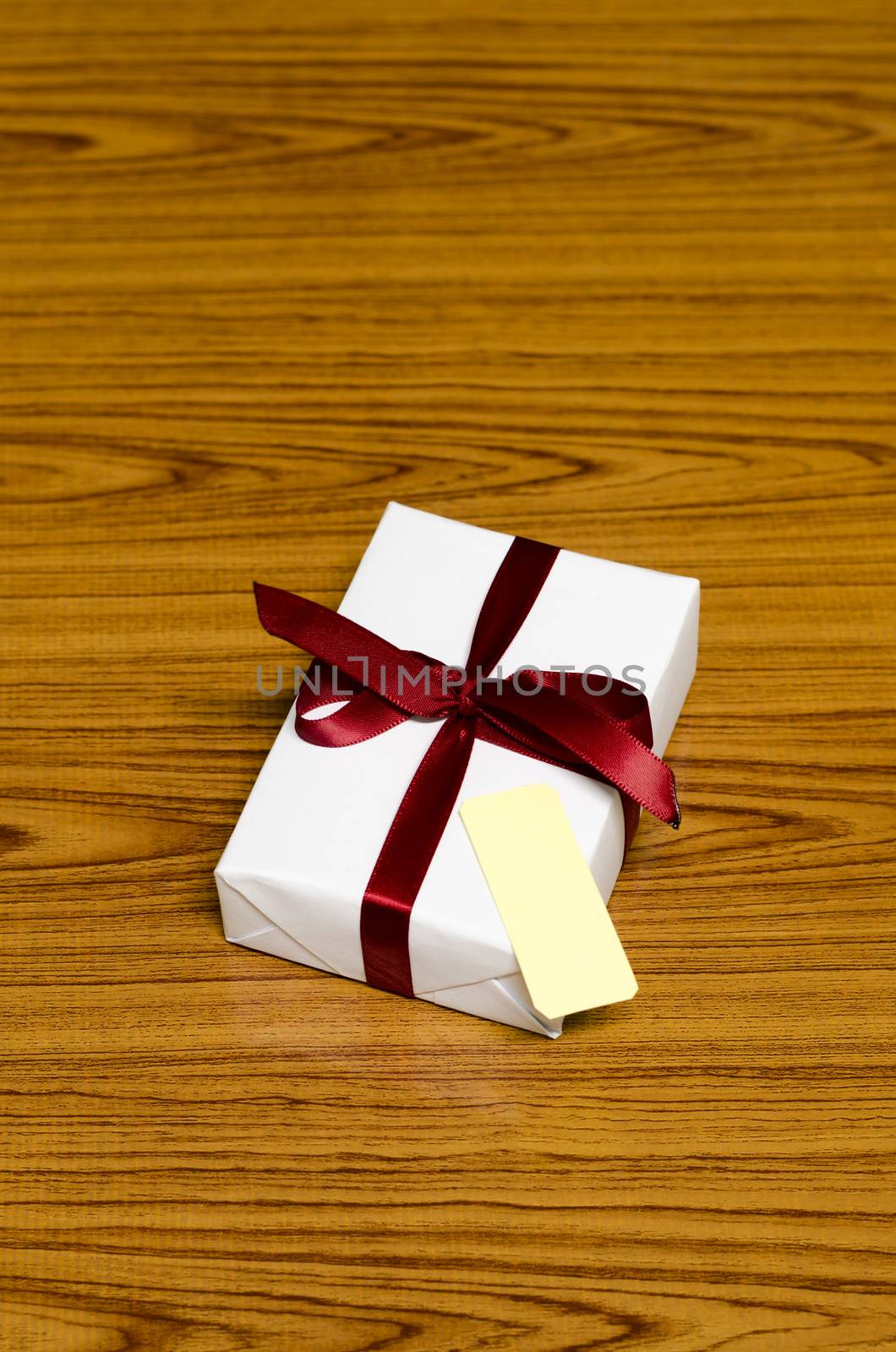 white gift box and red ribbin with tag by ammza12
