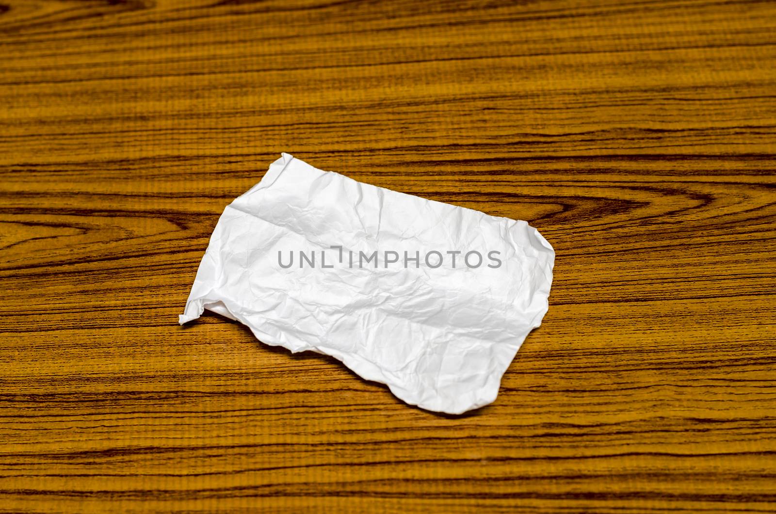 paper scrap on wood background