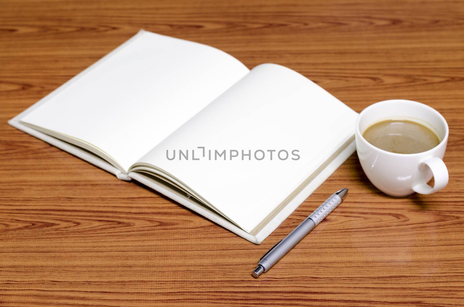 coffee and notebook on wood background concept coffee time