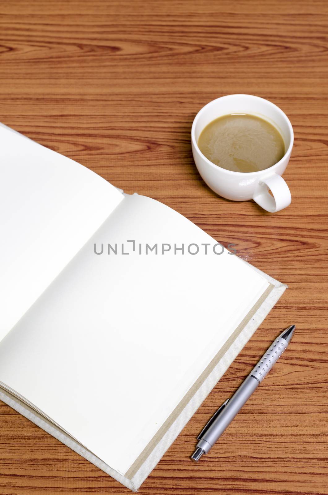 coffee and notebook on wood background concept coffee time