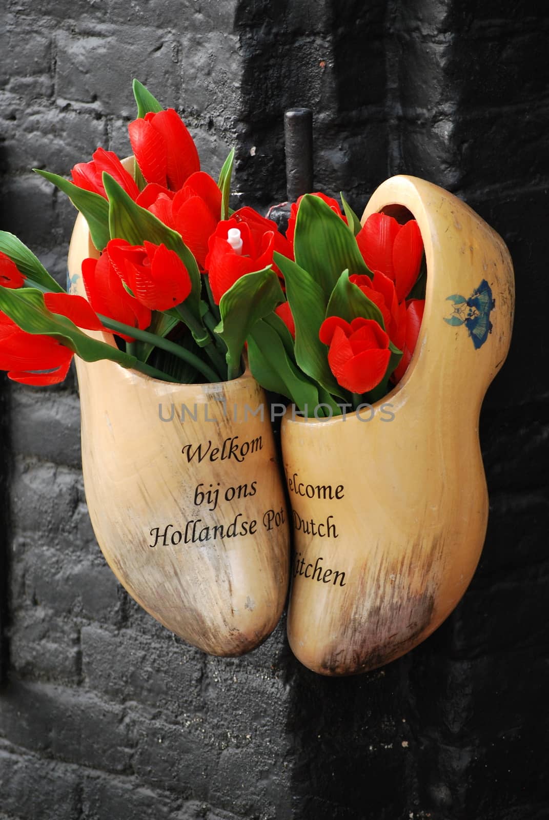 Amsterdam wooden clog shoes displayed outdoors.