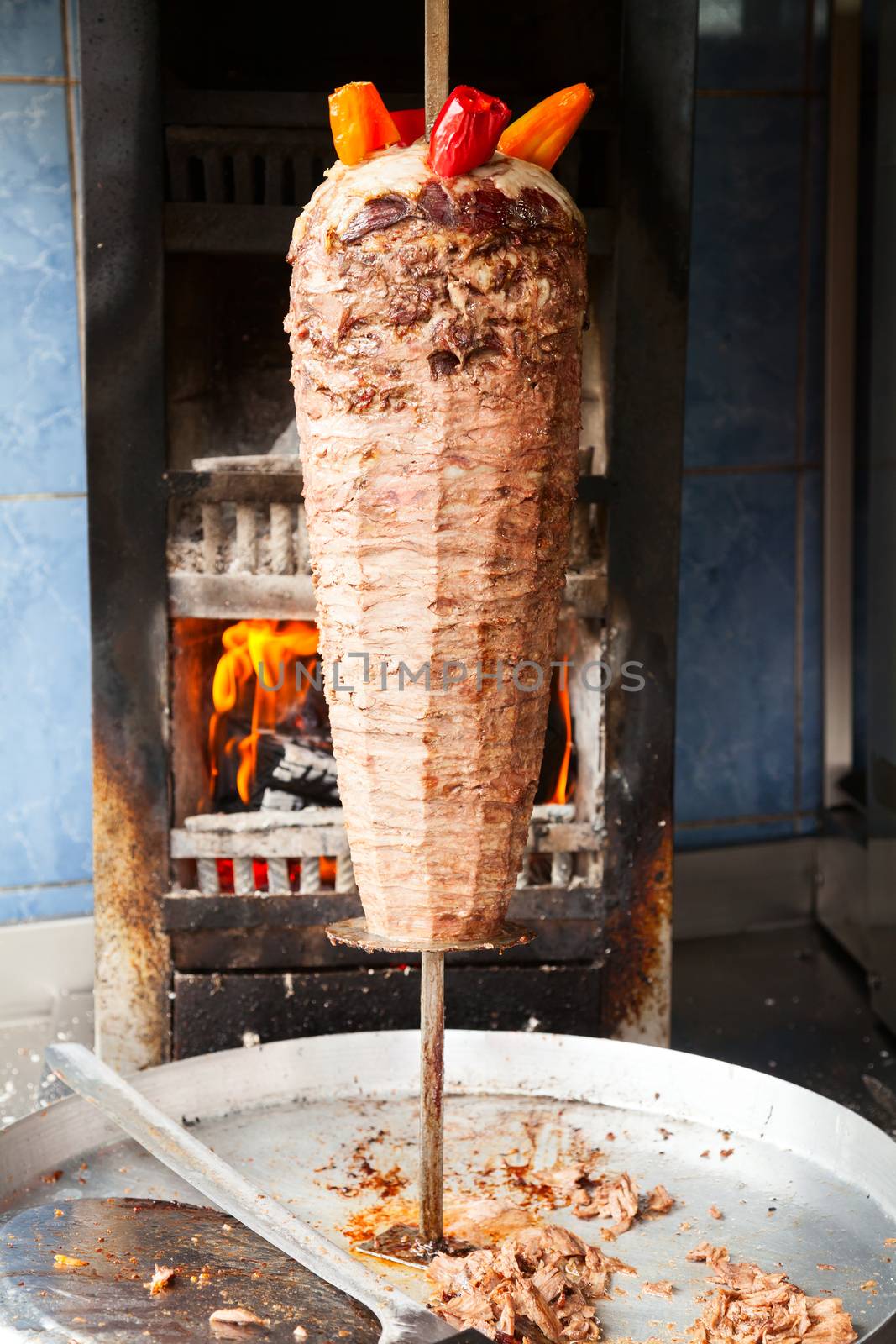Shawarma meat on rotating spit by naumoid