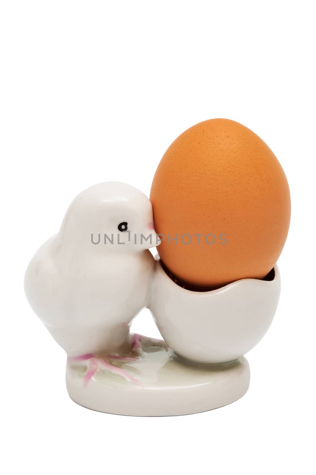 egg in eggcup on a white background