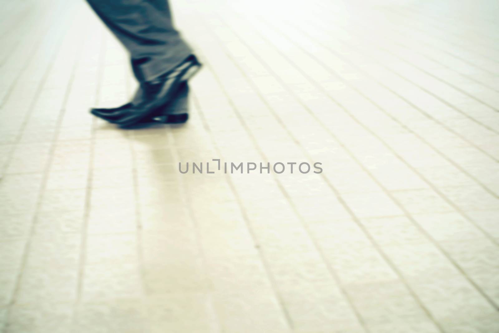 city business man walking in the street blur motion by nuchylee