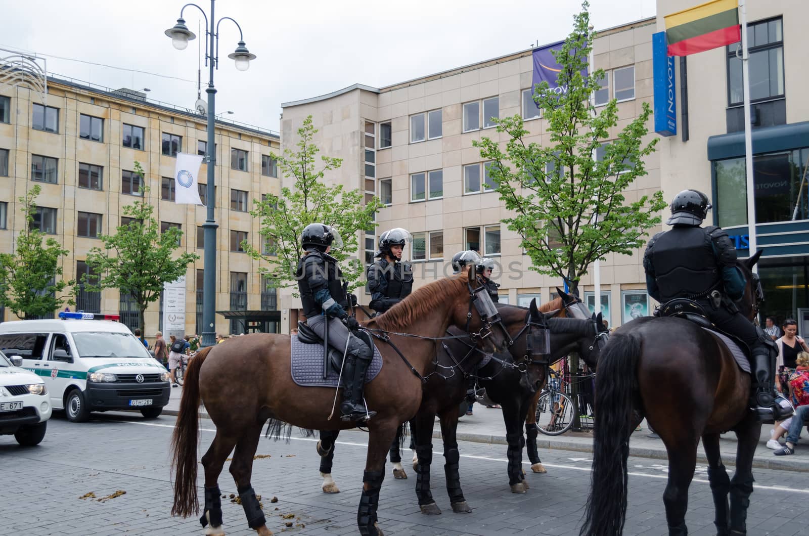 VILNIUS, LITHUANIA - JULY 27: police keep public event with strong riding horses on July 27, 2013 in VILNIUS, Lithuania. Mounted city police mobile force protection