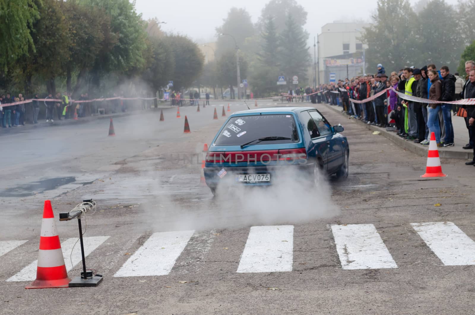 SIRVINTOS, LITHUANIA - SEPTEMBER 29: car ride in the slalom competition in city street on September 29, 2013 in Sirvintos, Lithuania.