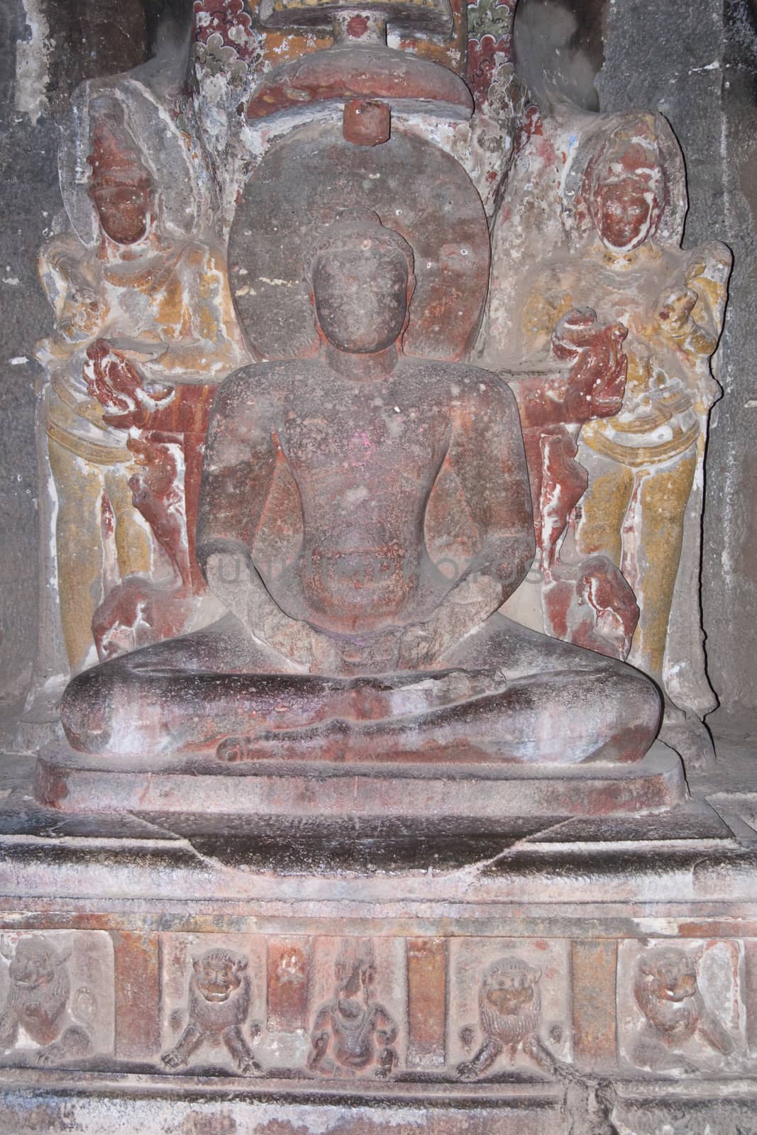 Religious images carved into solid rock inside an ancient Hindu cave temple, Ellora Caves near aurangabad, India.
