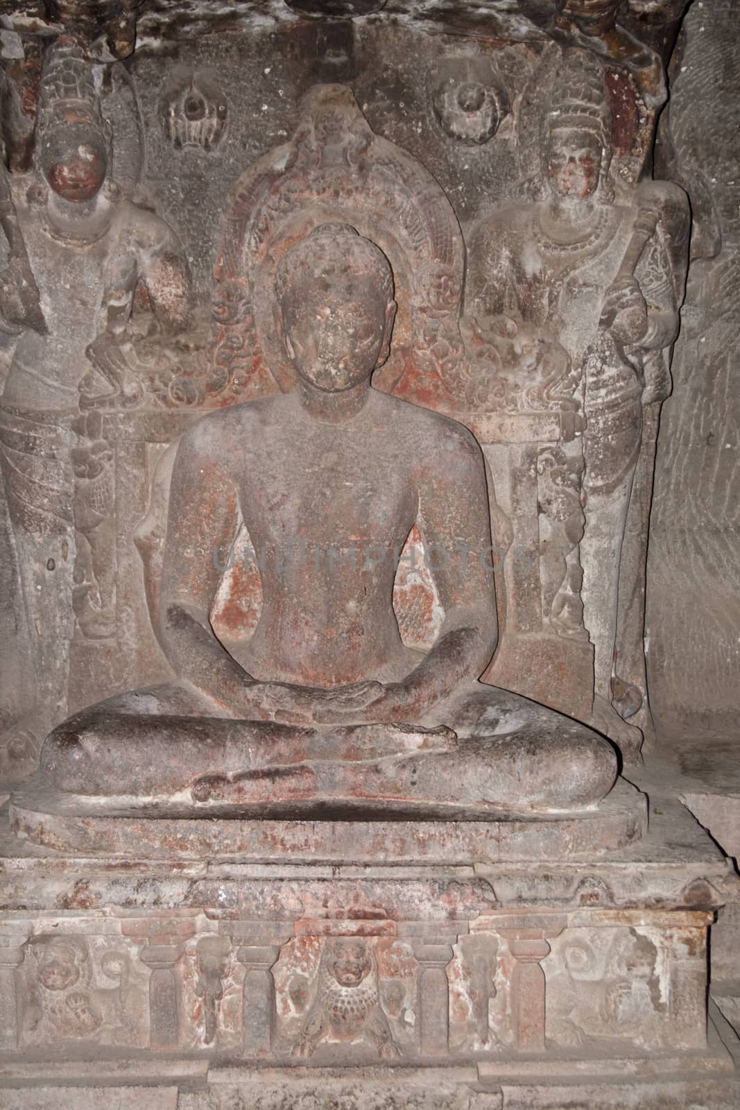 Religious images carved into solid rock inside an ancient Hindu cave temple, Ellora Caves near aurangabad, India.