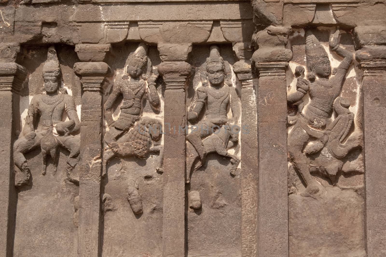 Stone carved statues on the front of the Kailas Hindu Temple at Ellora Caves, near Aurangabad, India. 8th Century AD