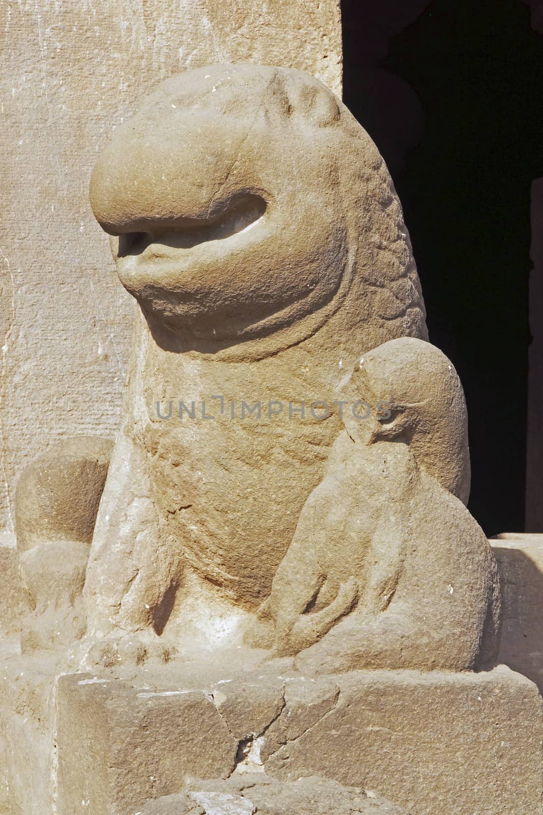 Statue of a lion guarding the entrance to the Hindu rock temple (Sita Ki Nahani), part of the Ellora Caves site in India