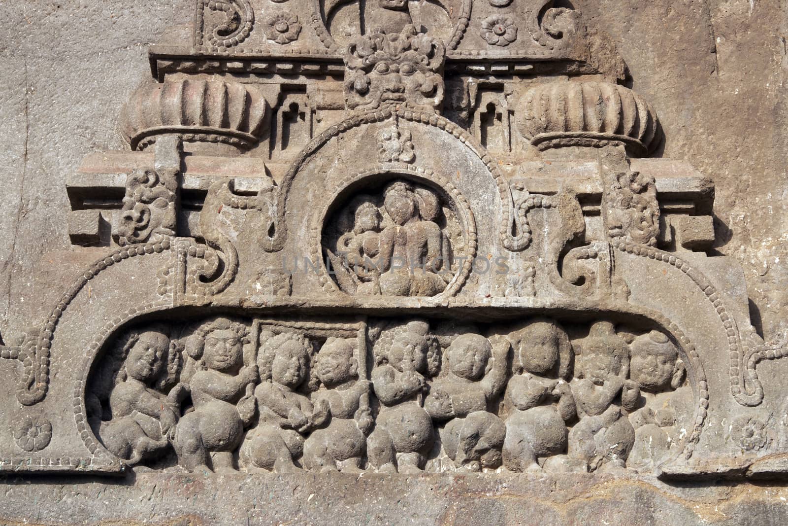 Religious carving around the entrance to a Buddhist cave temple at Ellora Caves in India. Vishwakarma Temple, Cave 10, 7th-8th Century AD