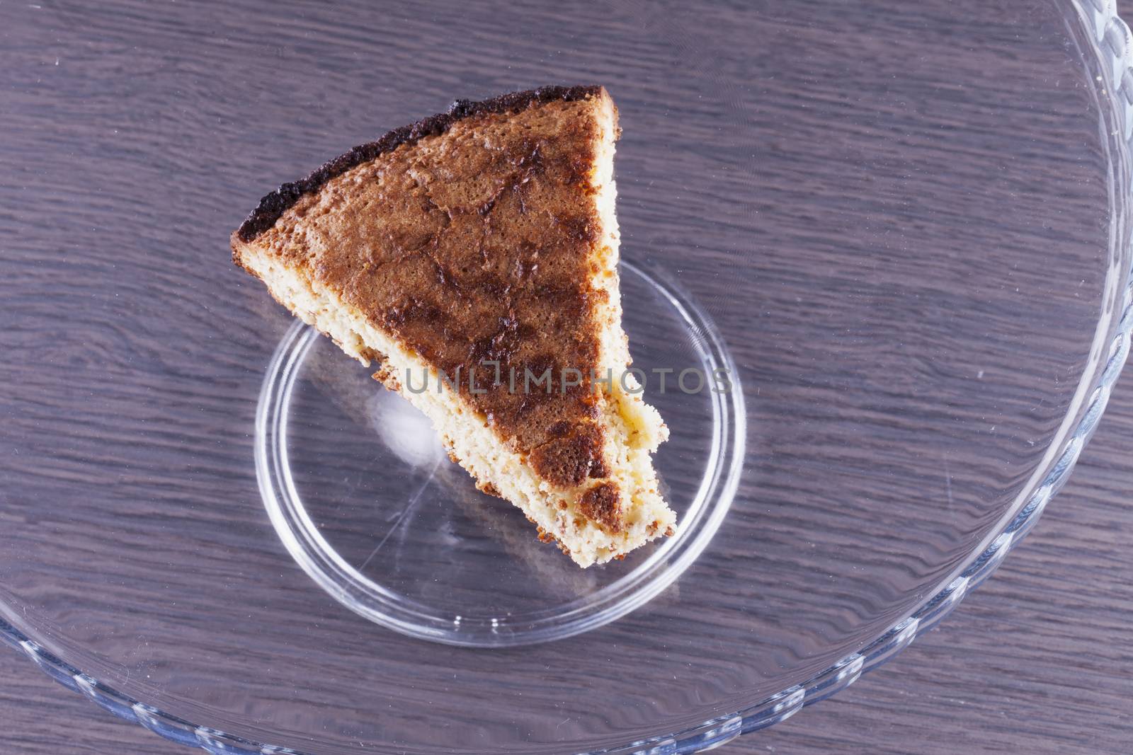 Cake slice in the middle of a glass cake stand