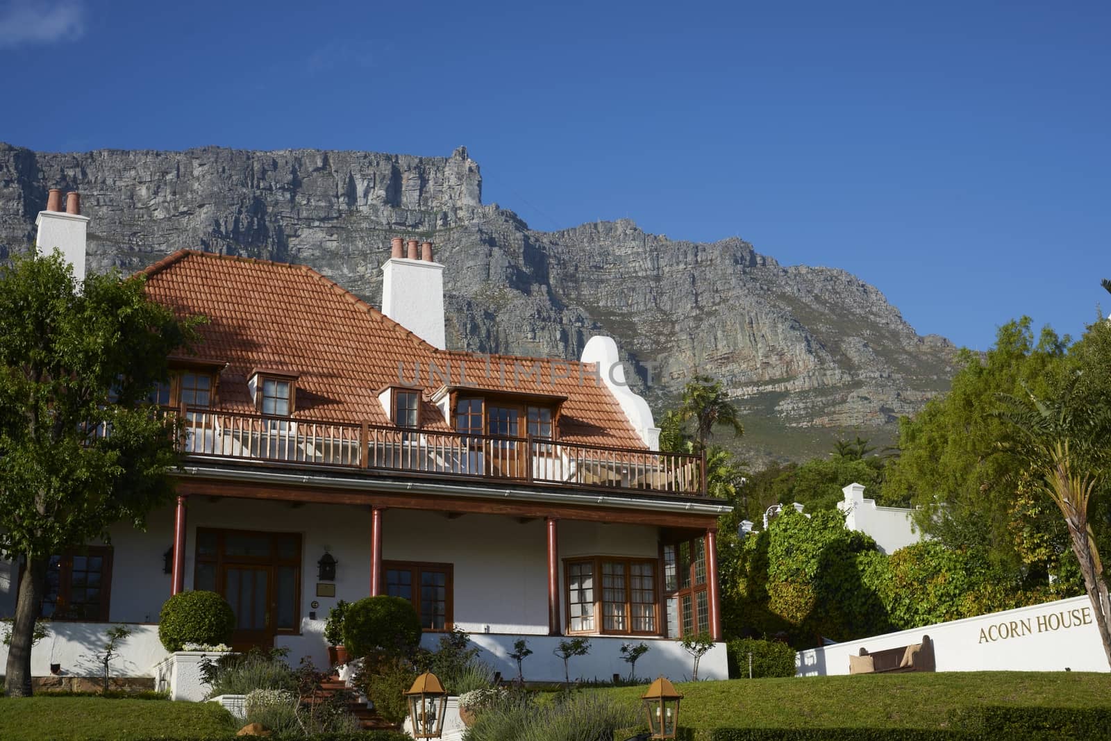 Large residential house nestling below Table Mountain in Cape Town, South Africa