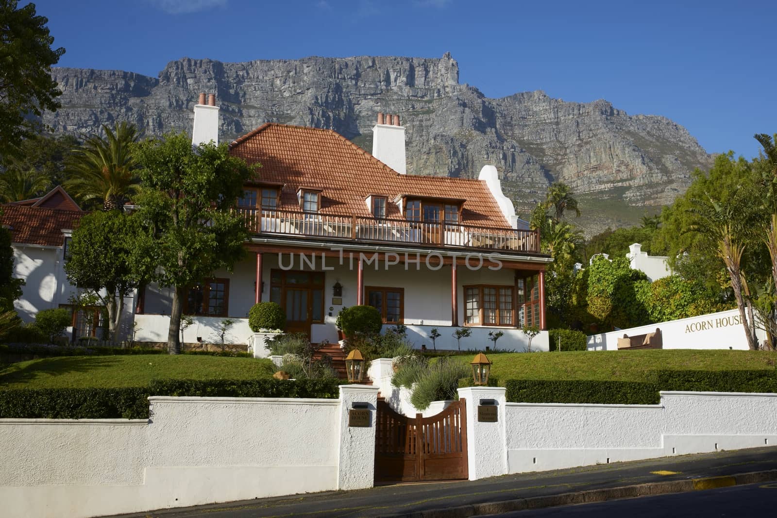 Large residential house nestling below Table Mountain in Cape Town, South Africa