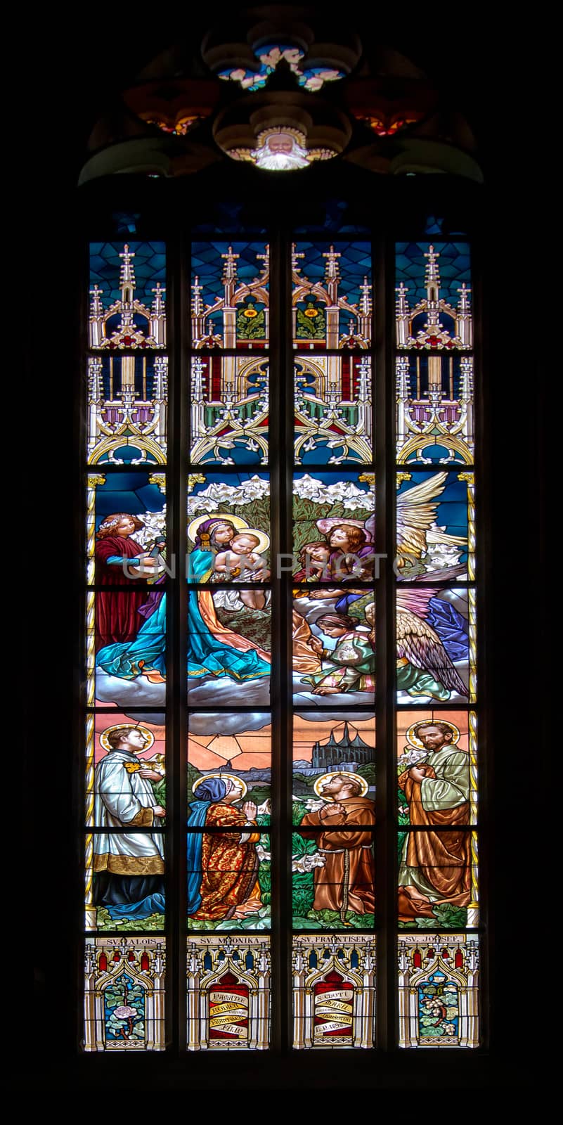 Detail of the color window - bullseye pane - lattice window. Public national monument - cathedral of St Barbara, Kutna Hora, Czech republic, Europe.