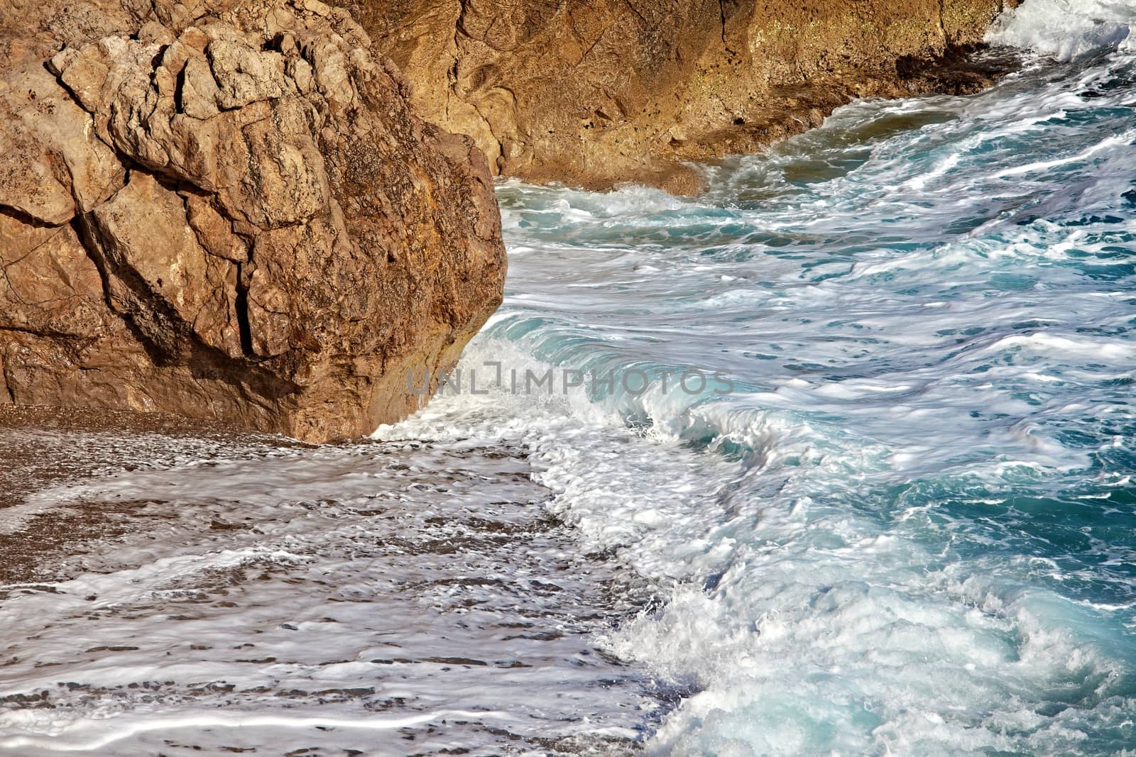 Waves hitting the rocky shore