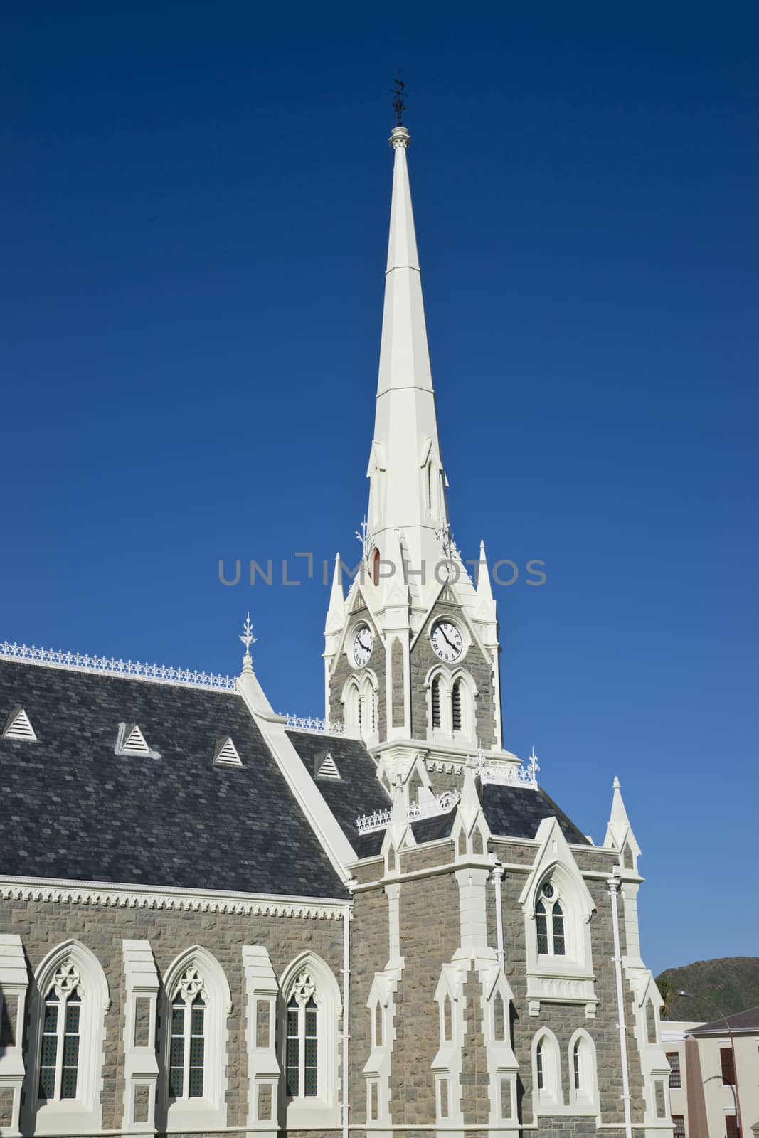 Dutch Reformed Church in Graaff-Reinet, Eastern Cape, South Africa. Imposing building in Cape Dutch style with tall steeple.